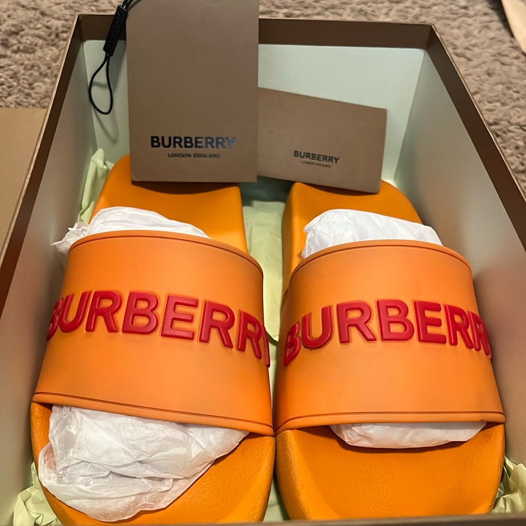 Burberry Slides. Deep Orange With Red Lettering.